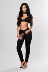 LOVEMI - Black jeans with embroidered feet