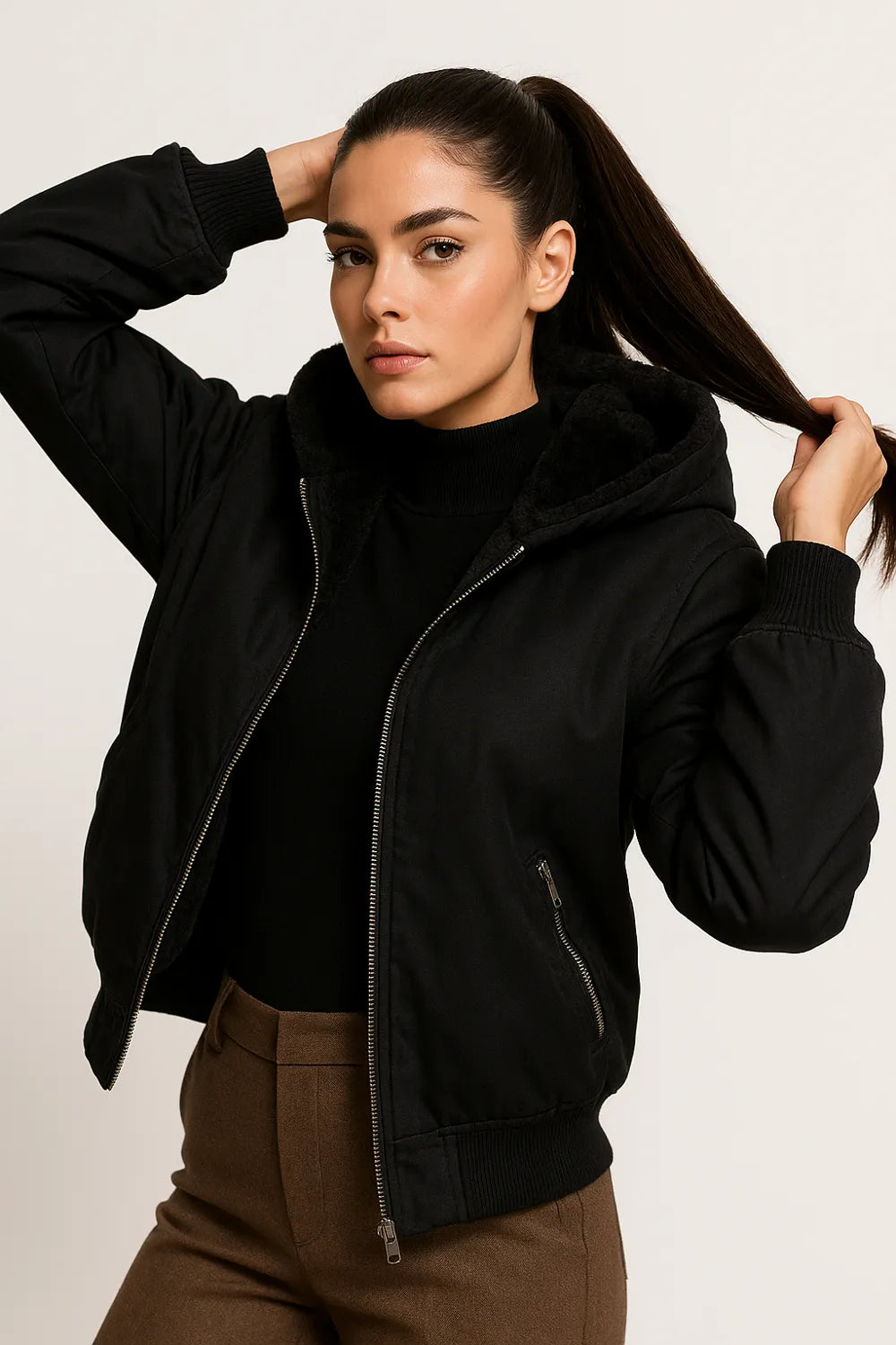 Black puffer jacket with hood and faux shearling lining, cozy winter outerwear for women.